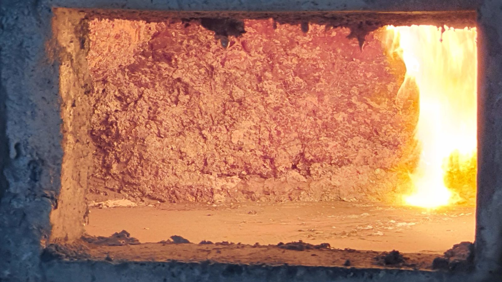Molten aluminium inside a melting furnace